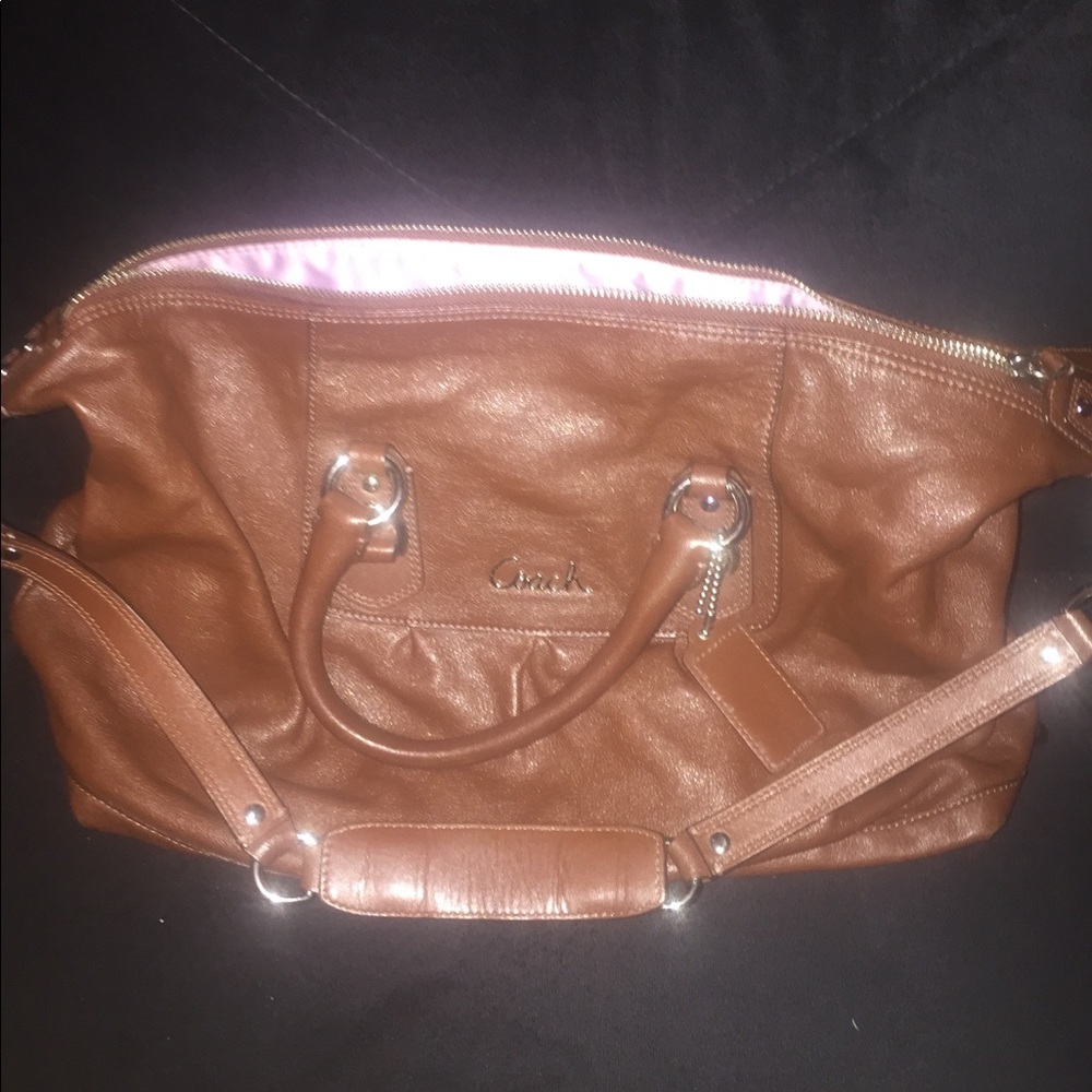 Brown COACH bag with lavender inside